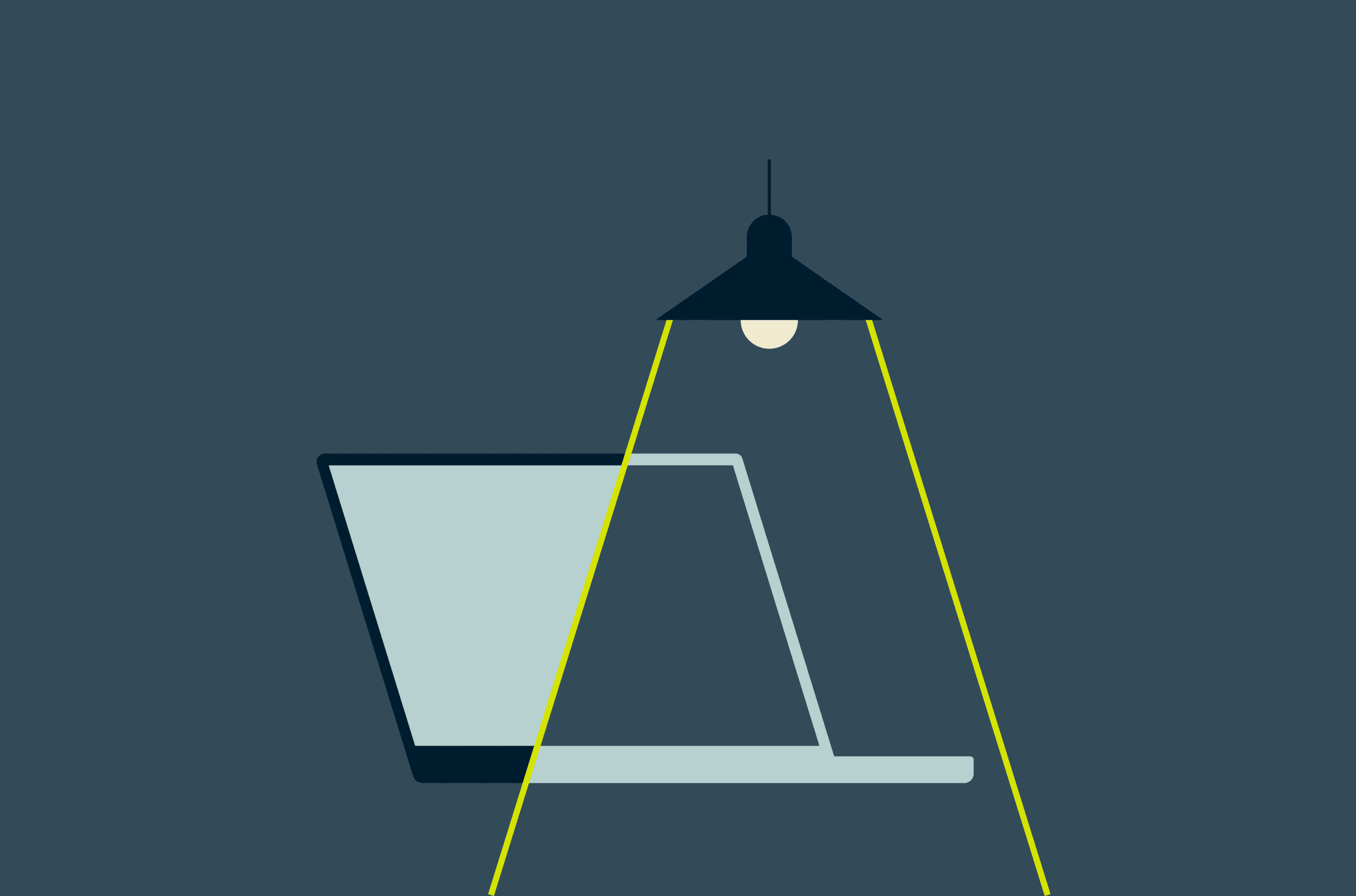 A laptop and a light in the dark.