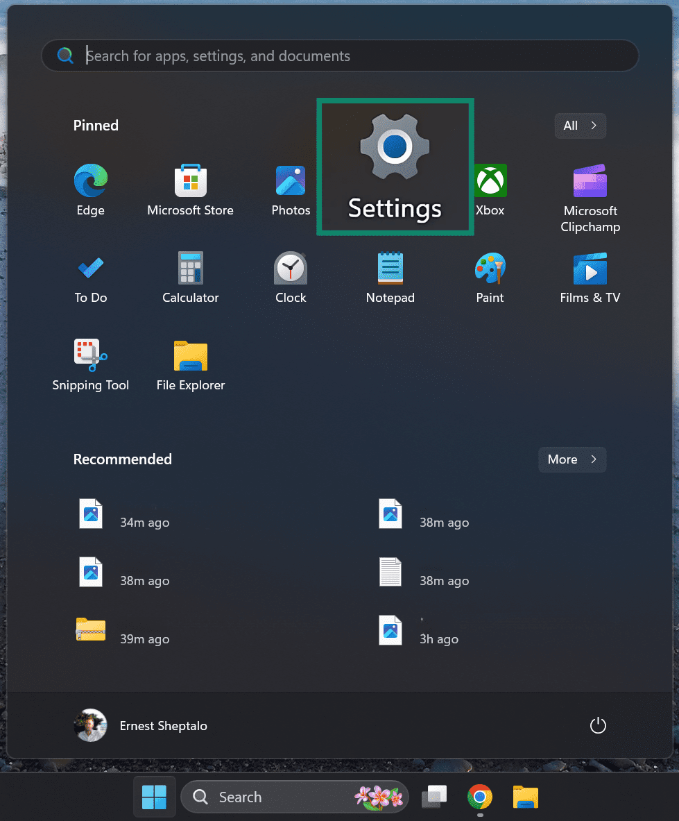 Press on the Windows icon and select the Setttings menu.